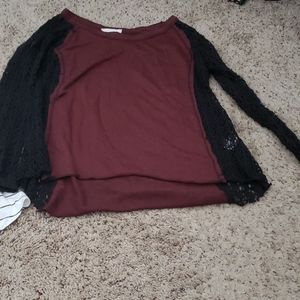 2 shirts, one long sleeve one t shirt. Dressier